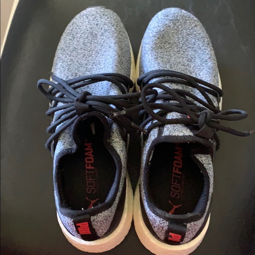 Men’s Puma athletic shoes.